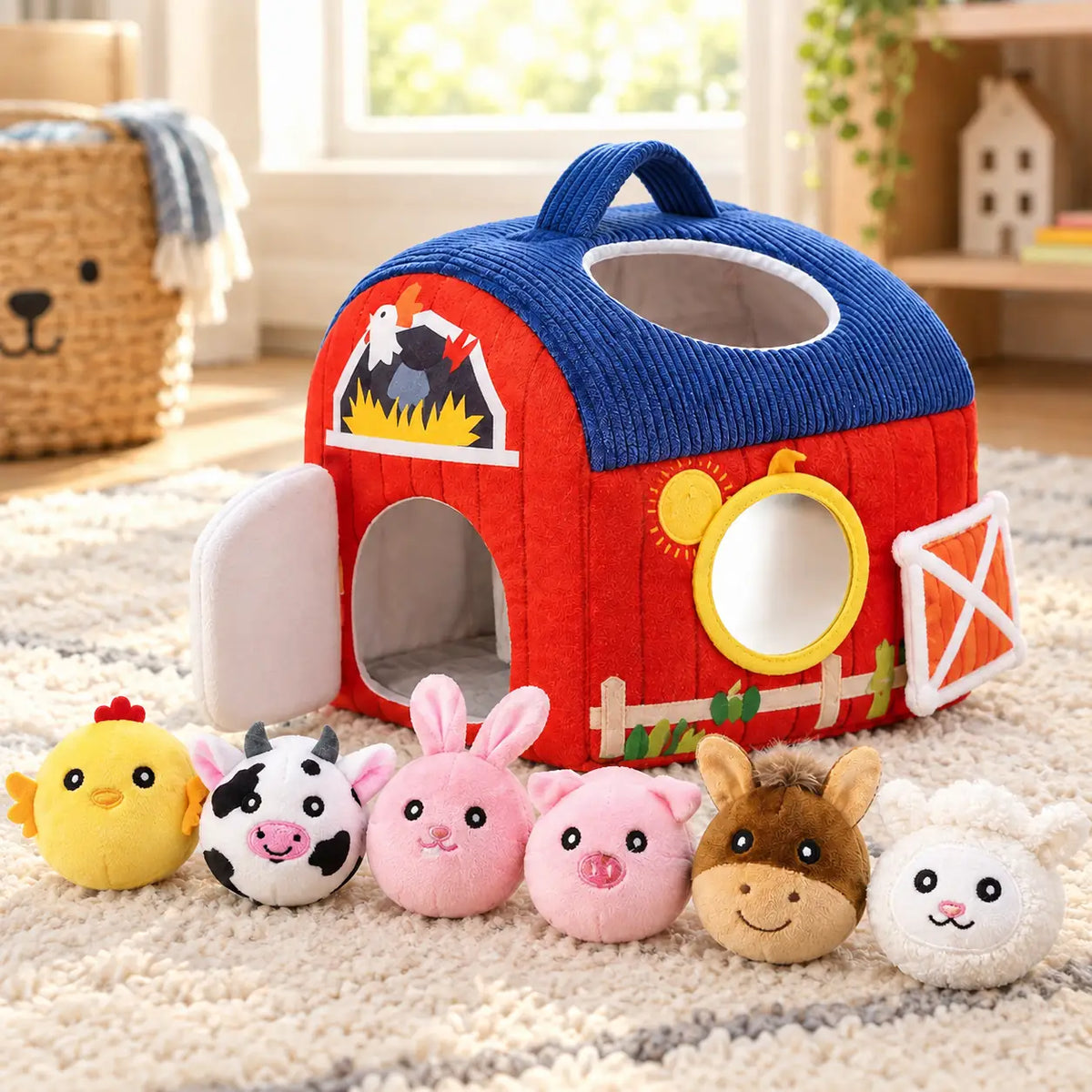 Soft play barn with its six plush farm animals, showing the roof opening and the lengthways carry handle