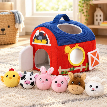 Soft play barn with its six plush farm animals, showing the roof opening and the lengthways carry handle