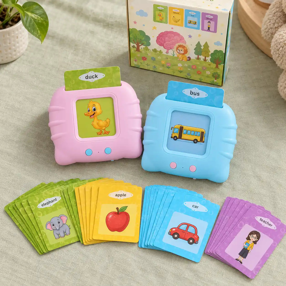 Pink and blue Little Cubs flash card readers with the box and colour-coded animal, food, vehicle and people cards