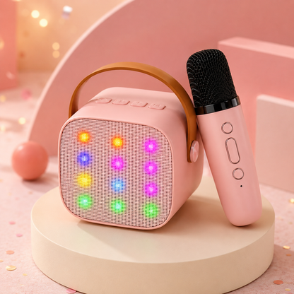 Pink kids karaoke machine Bluetooth speaker with twelve colour-changing LED lights and matching wireless microphone