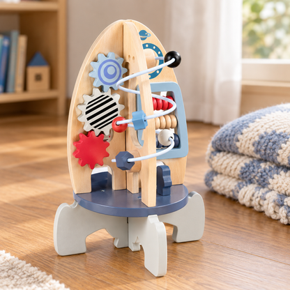 Wooden rocket activity centre showing its gears, bead maze and counting beads