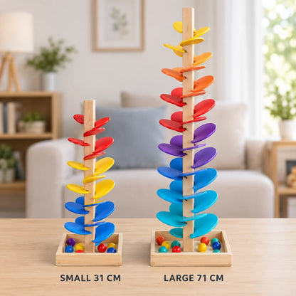 Size comparison: the 31cm small music tree beside the 71cm large rainbow music tree, leaves spiralling round the post